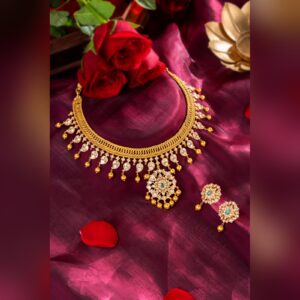 Antique gold necklace set with gold ball fringe and matching earrings, by Sri Sai Krishna Jewellers