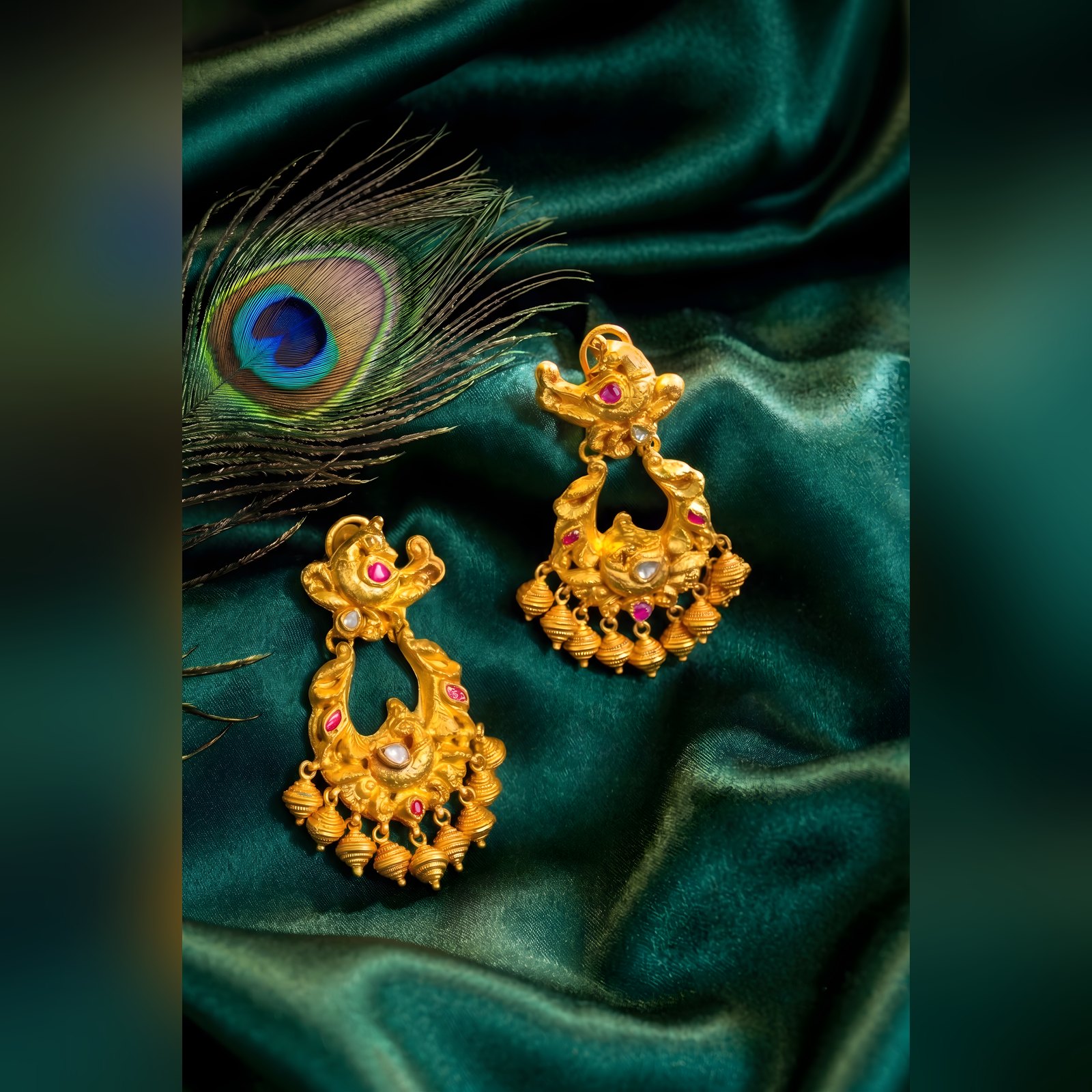 Antique gold peacock chandbali earrings with jhumka fringe by Sri Sai Krishna Jewellers