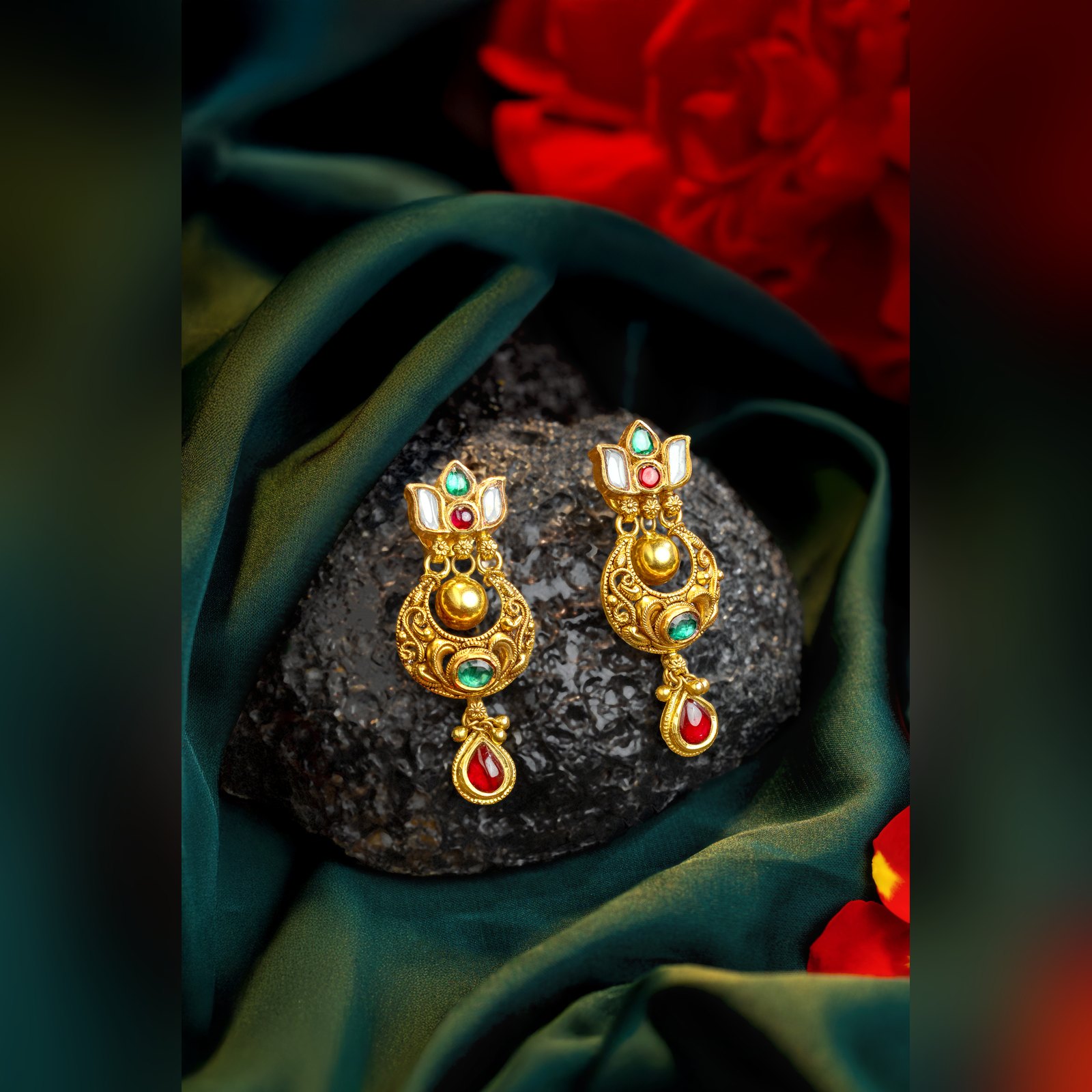 Antique gold ruby and emerald drop earrings by Sri Sai Krishna Jewellers