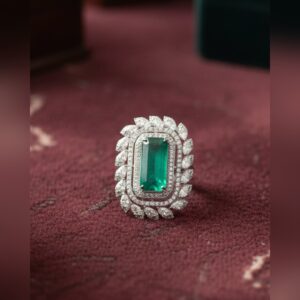 Emerald cut emerald and diamond cocktail ring in white gold by Sri Sai Krishna Jewellers