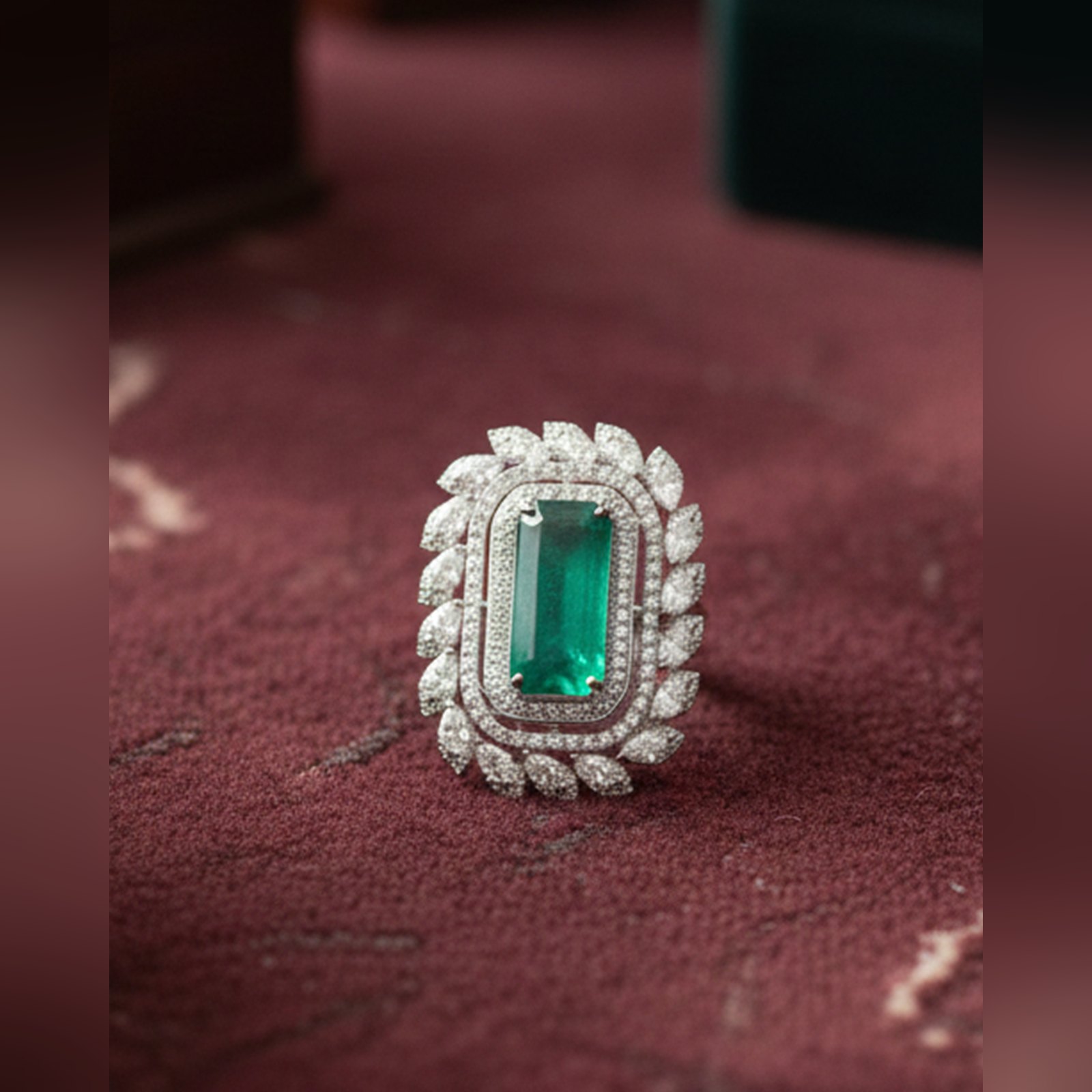 Emerald cut emerald and diamond cocktail ring in white gold by Sri Sai Krishna Jewellers