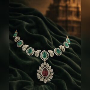 Emerald and diamond necklace with pear cut ruby pendant, by Sri Sai Krishna Jewellers