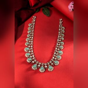 Emerald and polki long haram necklace by Sri Sai Krishna Jewellers
