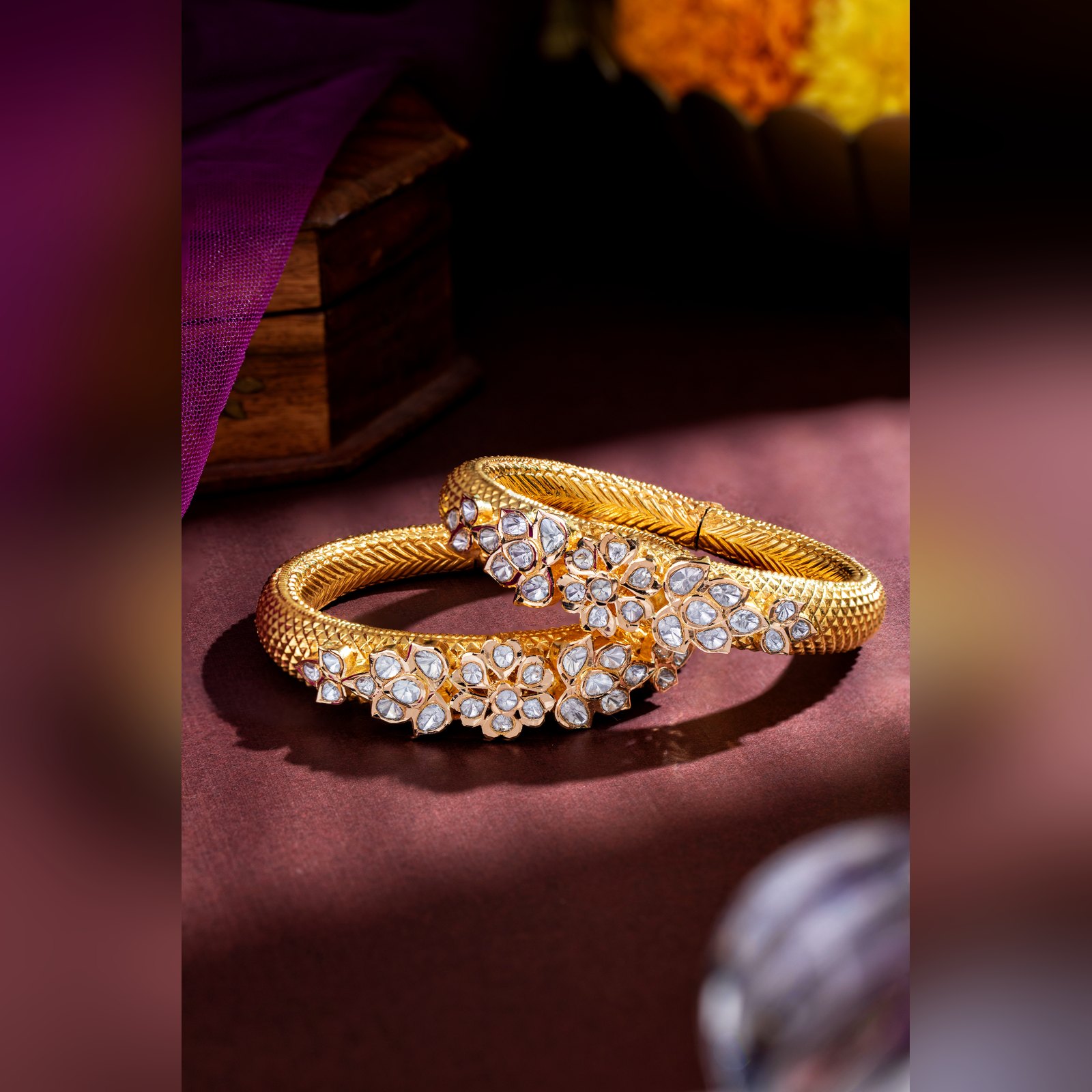 Pair of antique gold kada with polki floral motifs by Sri Sai Krishna Jewellers