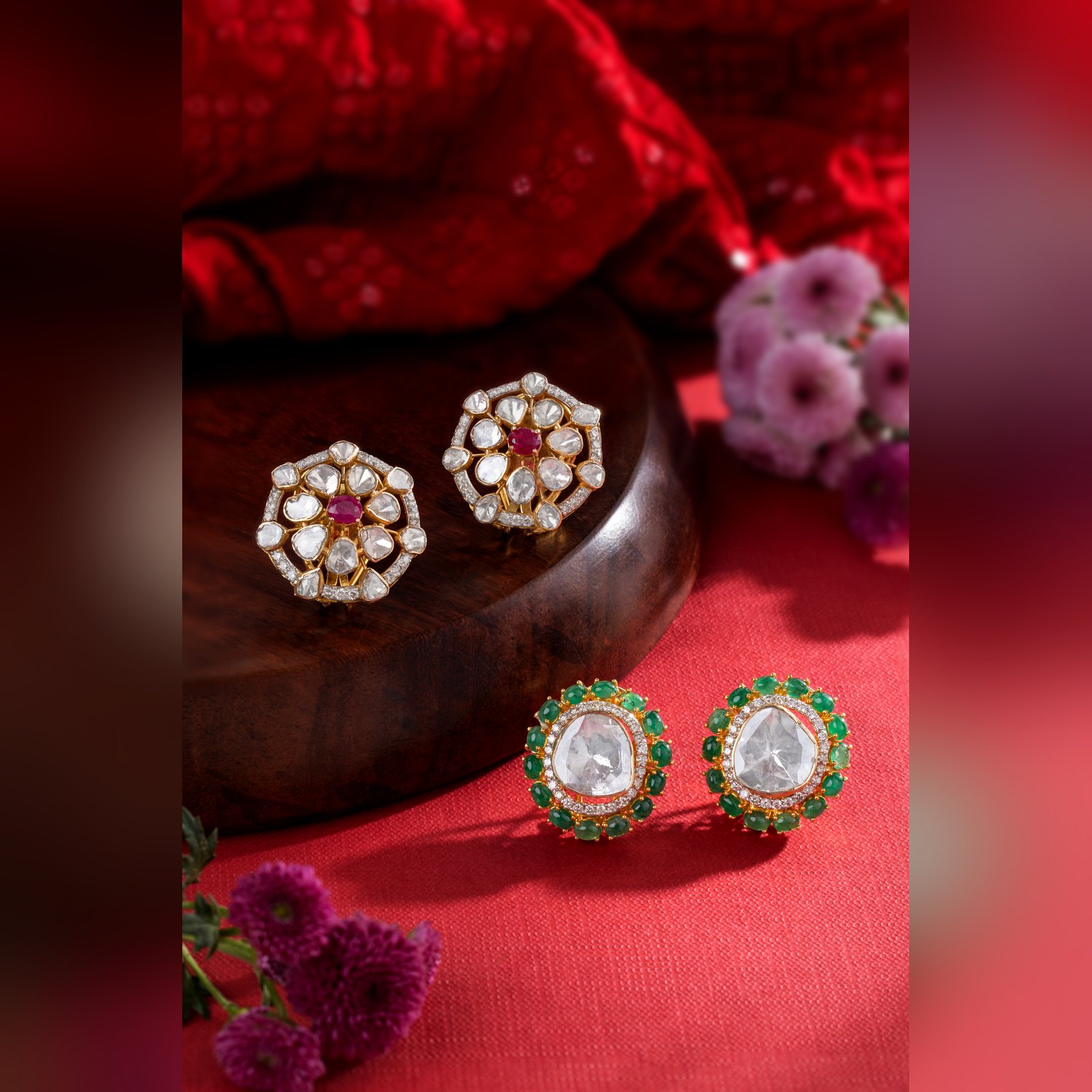 Two pairs of polki stud earrings with ruby and emerald settings by Sri Sai Krishna Jewellers