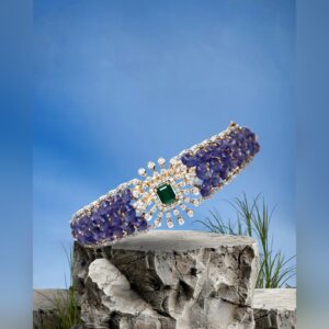Tanzanite bead bangle with emerald and diamond centre by Sri Sai Krishna Jewellers