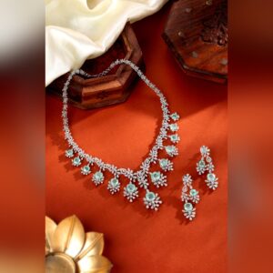 White gold diamond and aquamarine necklace set with matching earrings by Sri Sai Krishna Jewellers