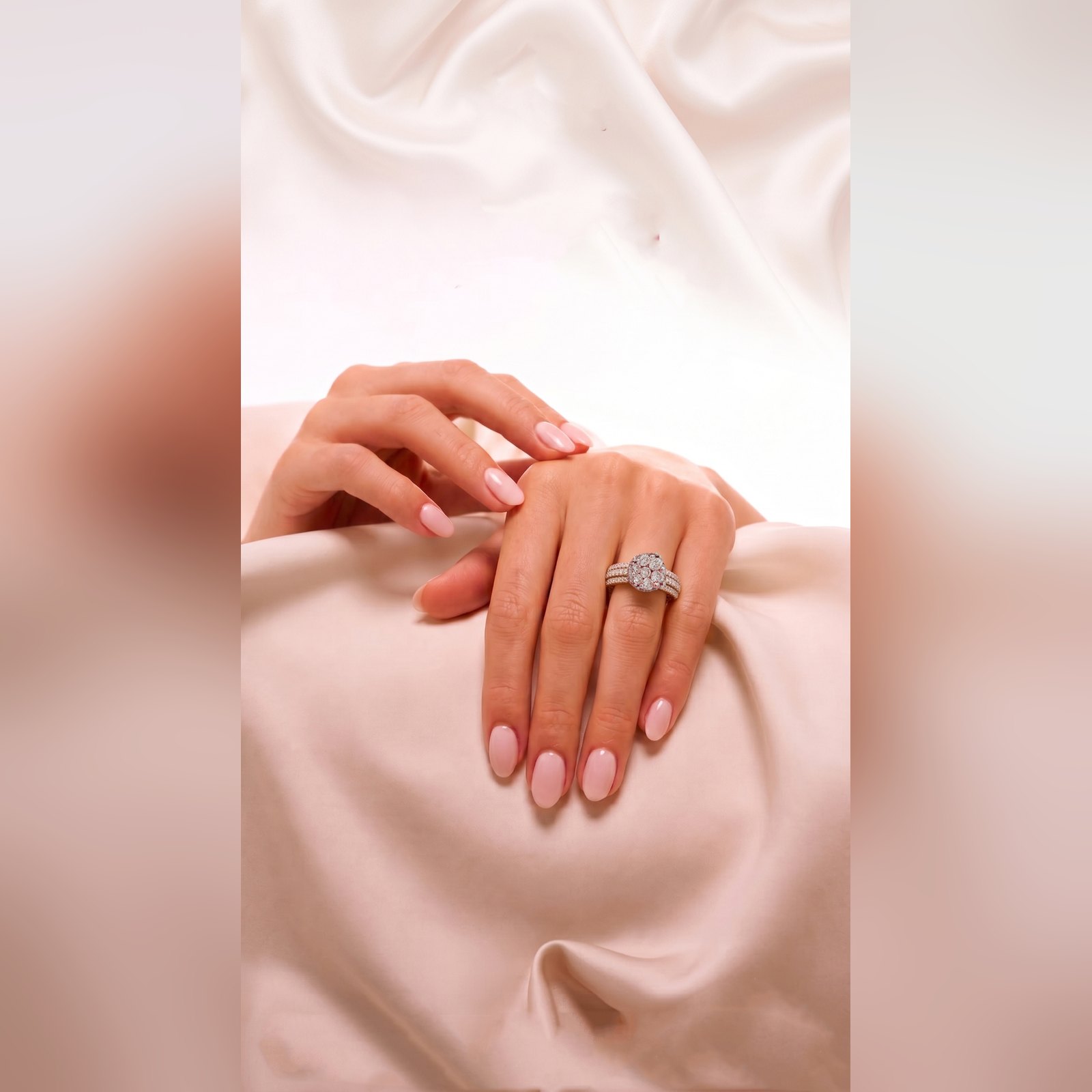 White gold diamond cluster ring worn on hand, by Sri Sai Krishna Jewellers